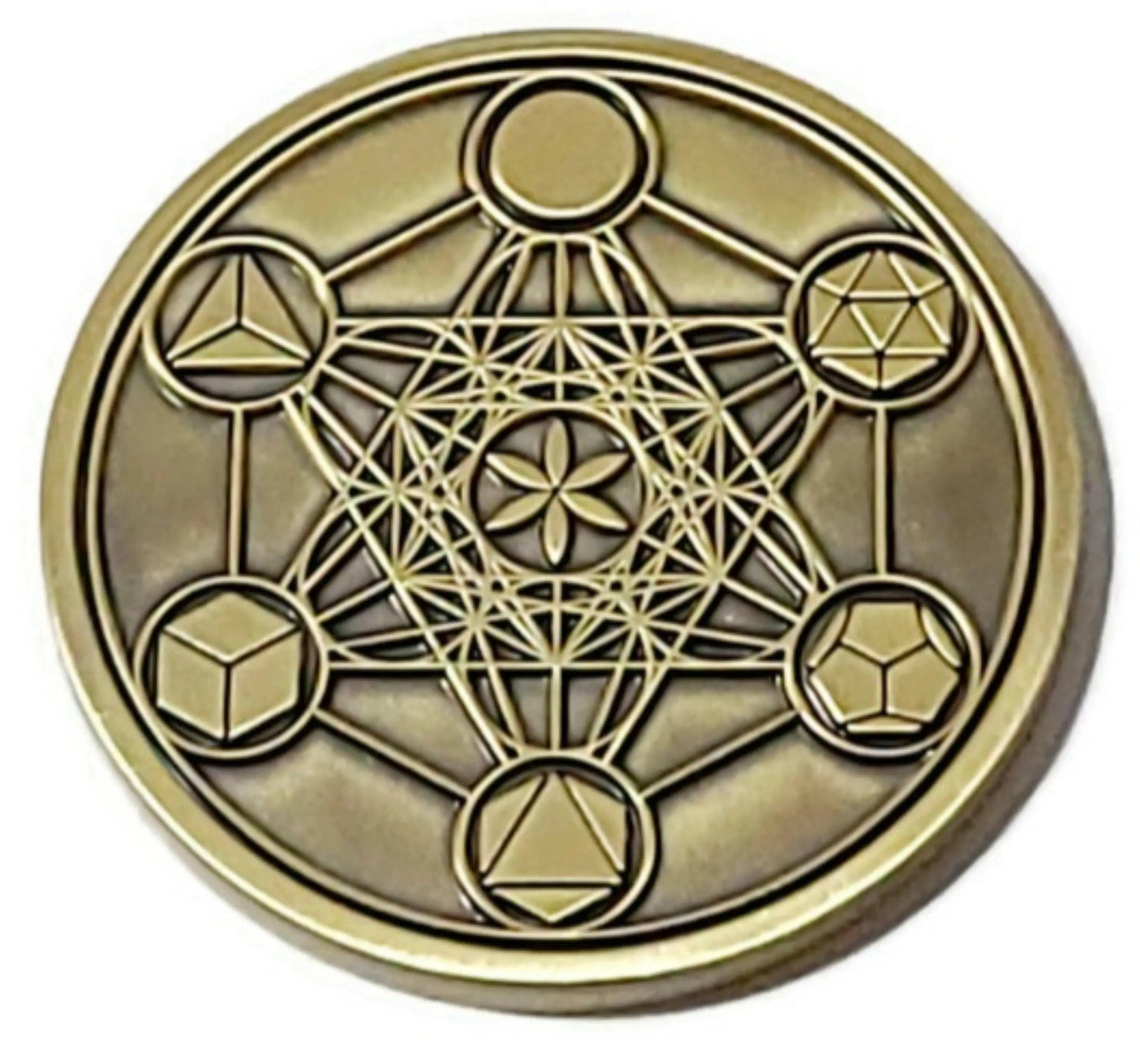 Metatron Cube talisman coin held in hand, solid brass engraved seal