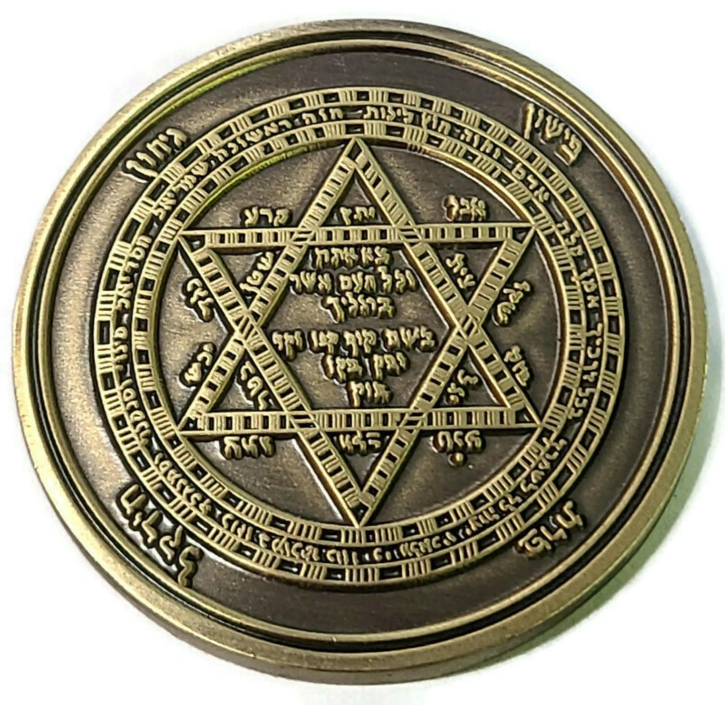 Sefer Raziel HaMalach talisman coin held in hand, solid brass engraved seal