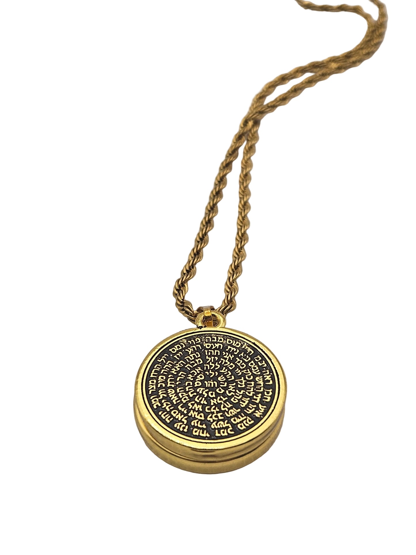 Gold necklace with a round pendant on a light gray background