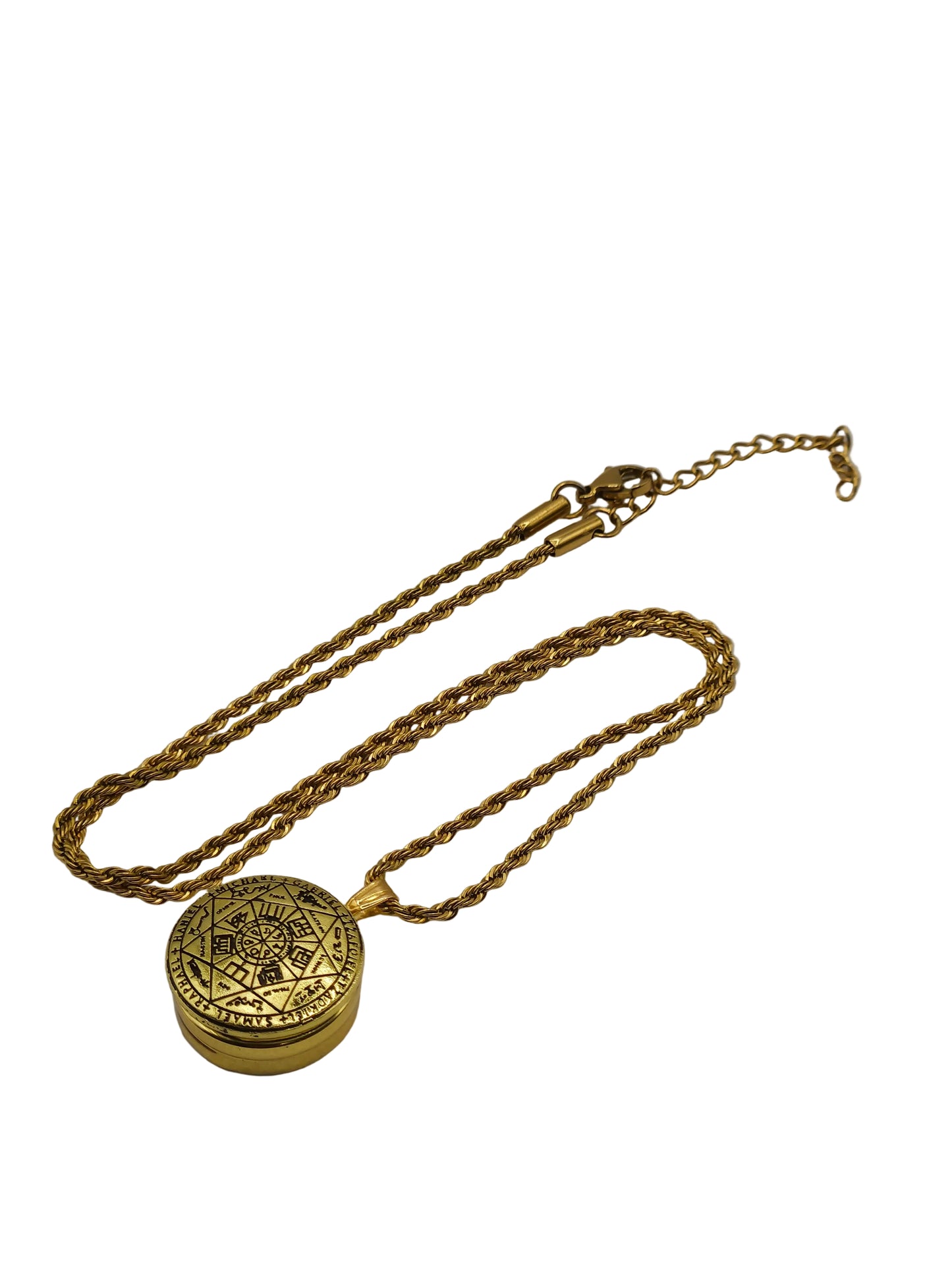 Gold necklace with a decorative pendant on a white background