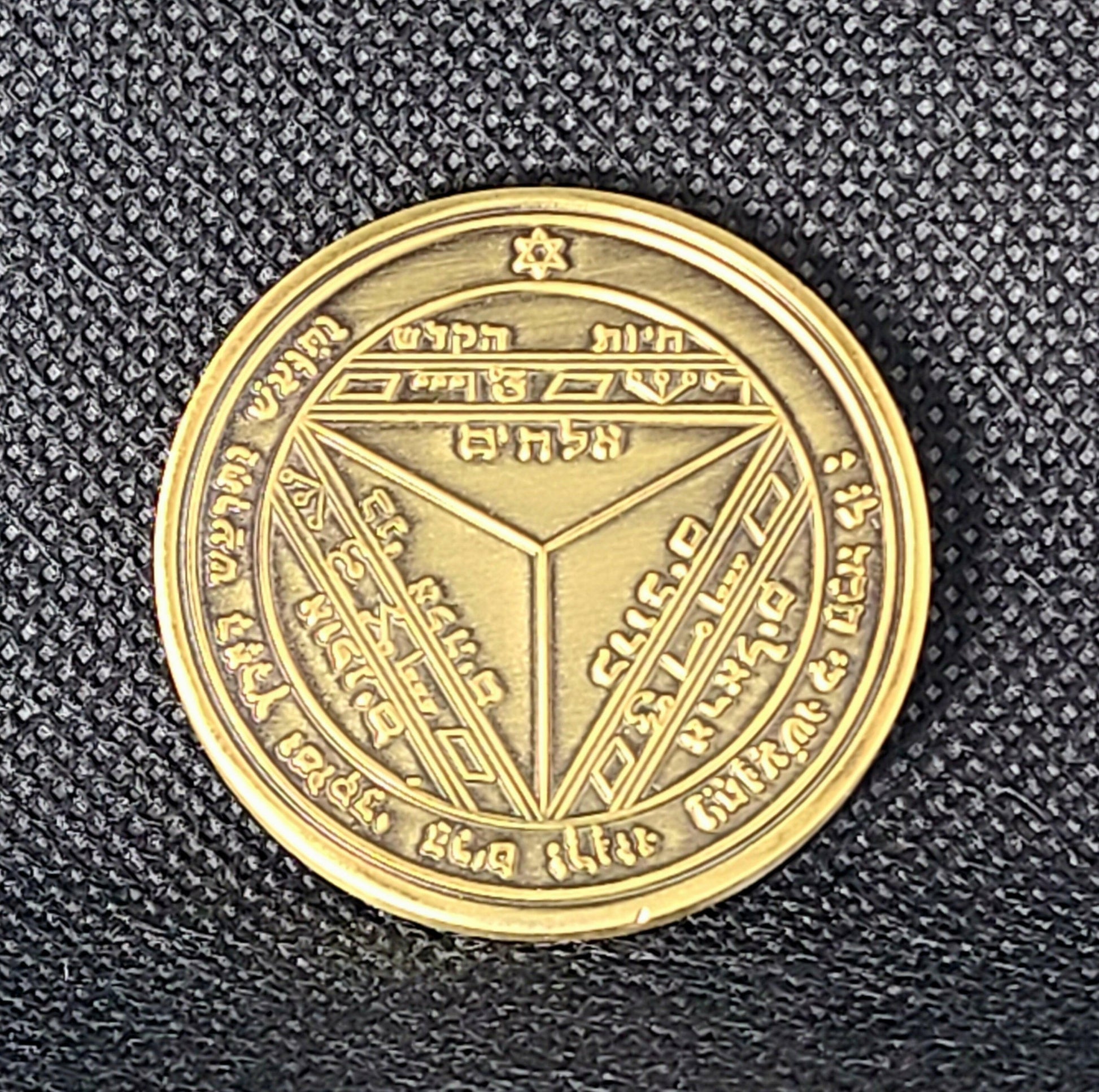 Seventh Pentacle of Saturn 72 names of God.